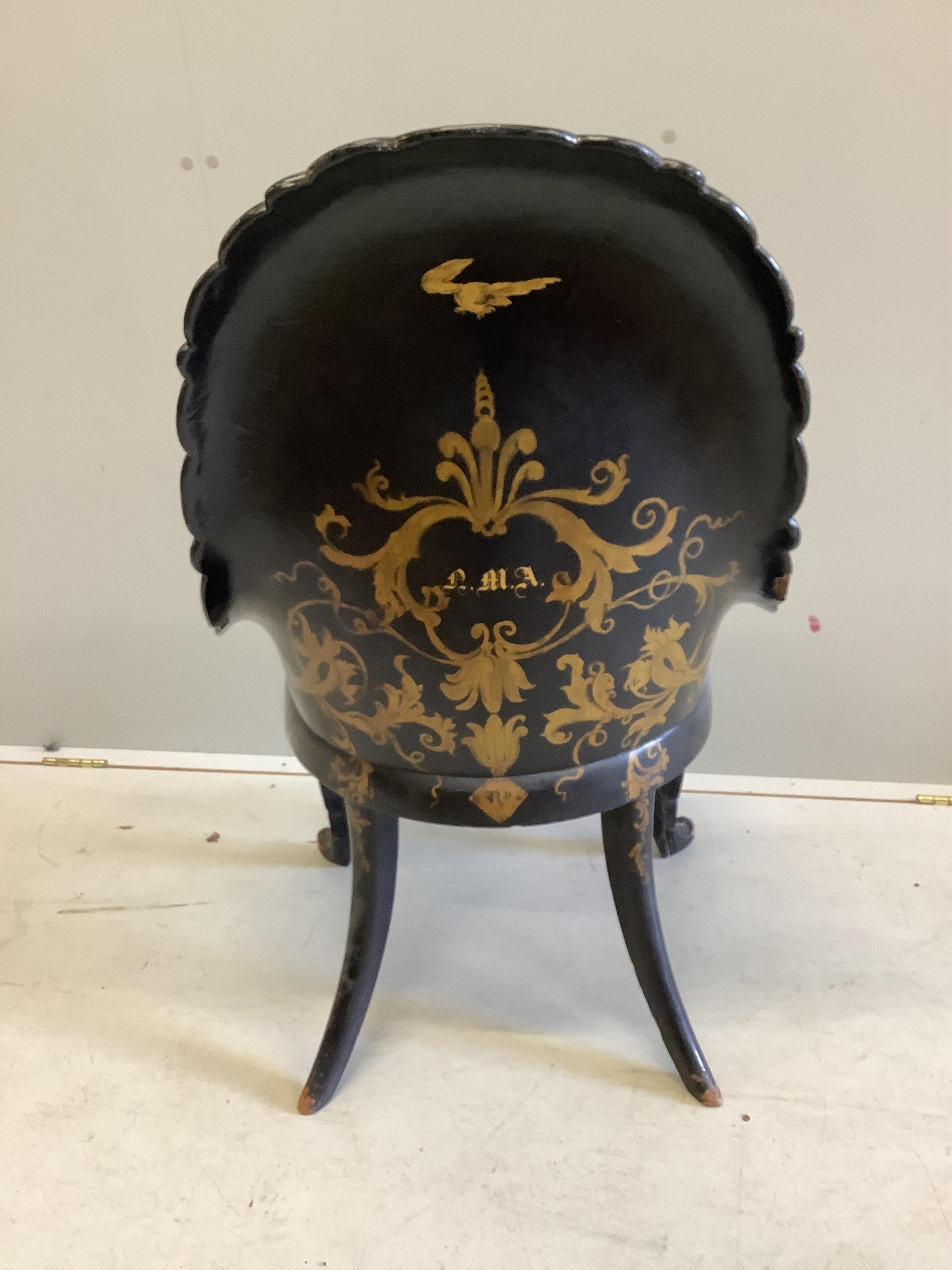 A Victorian papier mache salon chair, with mother of pearl inlay and registration number on the back, width 60cm, height 95cm. Condition - small areas of wear but essentially good condition